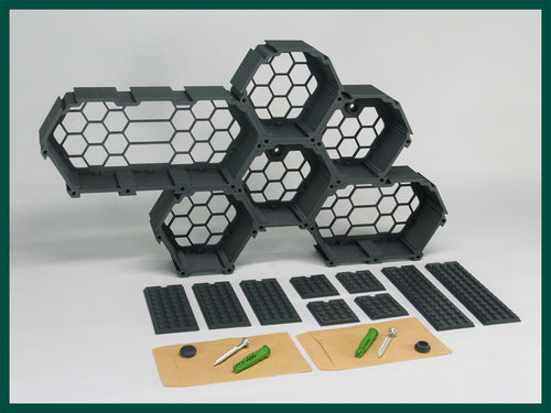 FAVO F.1 Starter Set display - hex modules arranged on wall in Astro Gray colour